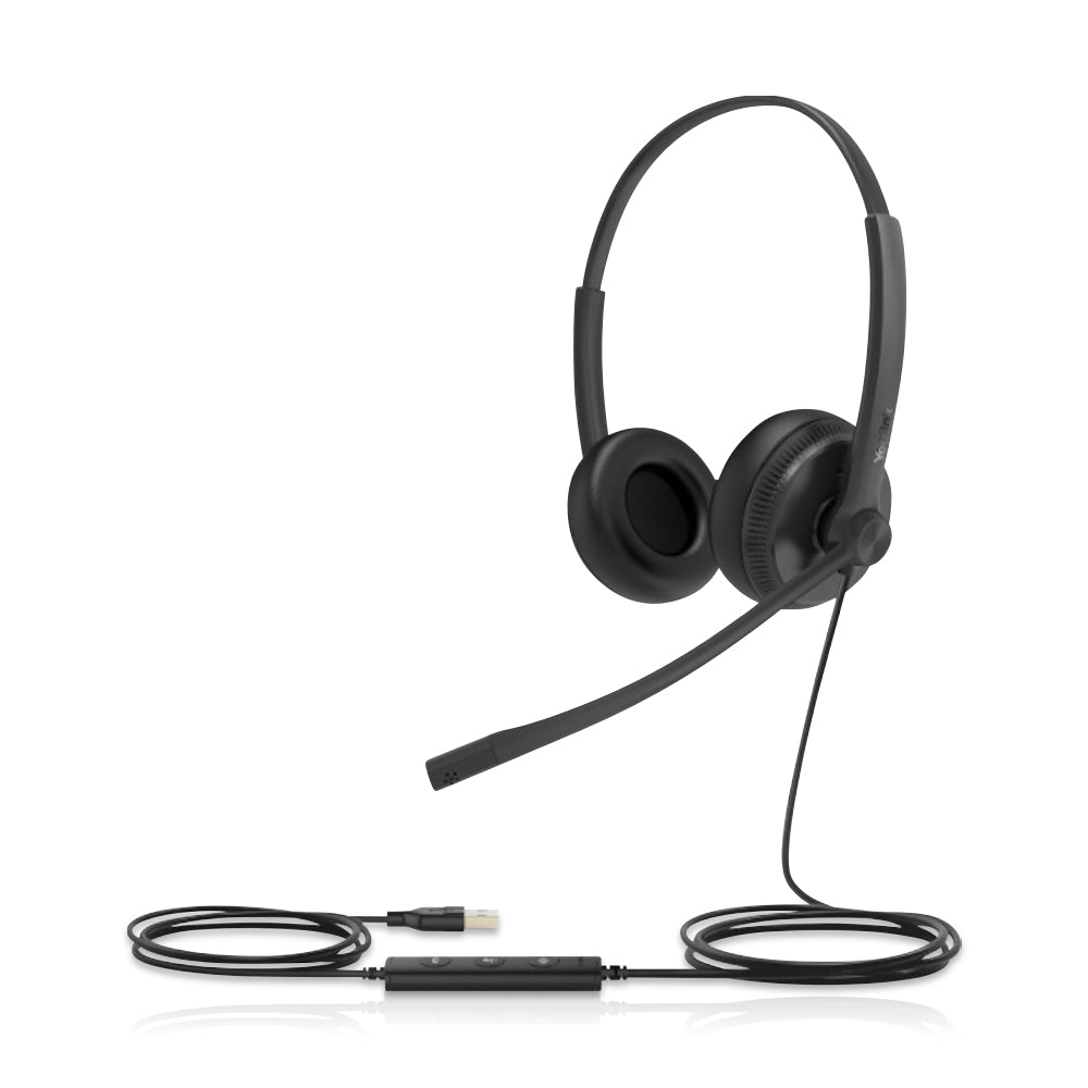A black UH34 Wired Headset with a binaural design is captured from a slightly left-rotated angle on a white background. The headset showcases its two ear cups, adjustable headband, and integrated microphone, providing exceptional comfort and audio performance. The visible USB cord ensures a reliable and hassle-free connection for seamless communication. With its sleek and professional design, the UH34 Wired Headset is the perfect companion for productive and immersive work environments.