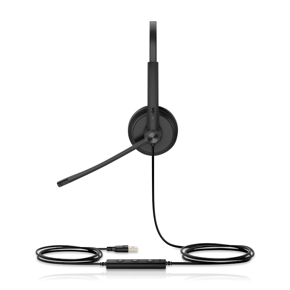A black UH34 Wired Headset with a binaural design is showcased from a side angle on a white background. The headset highlights its two ear cups, adjustable headband, and integrated microphone, offering optimal comfort and functionality. The visible USB cord ensures a secure and reliable connection for seamless audio transmission. With its sleek design and superior audio quality, the UH34 Wired Headset is an excellent choice for professionals seeking enhanced communication experiences.