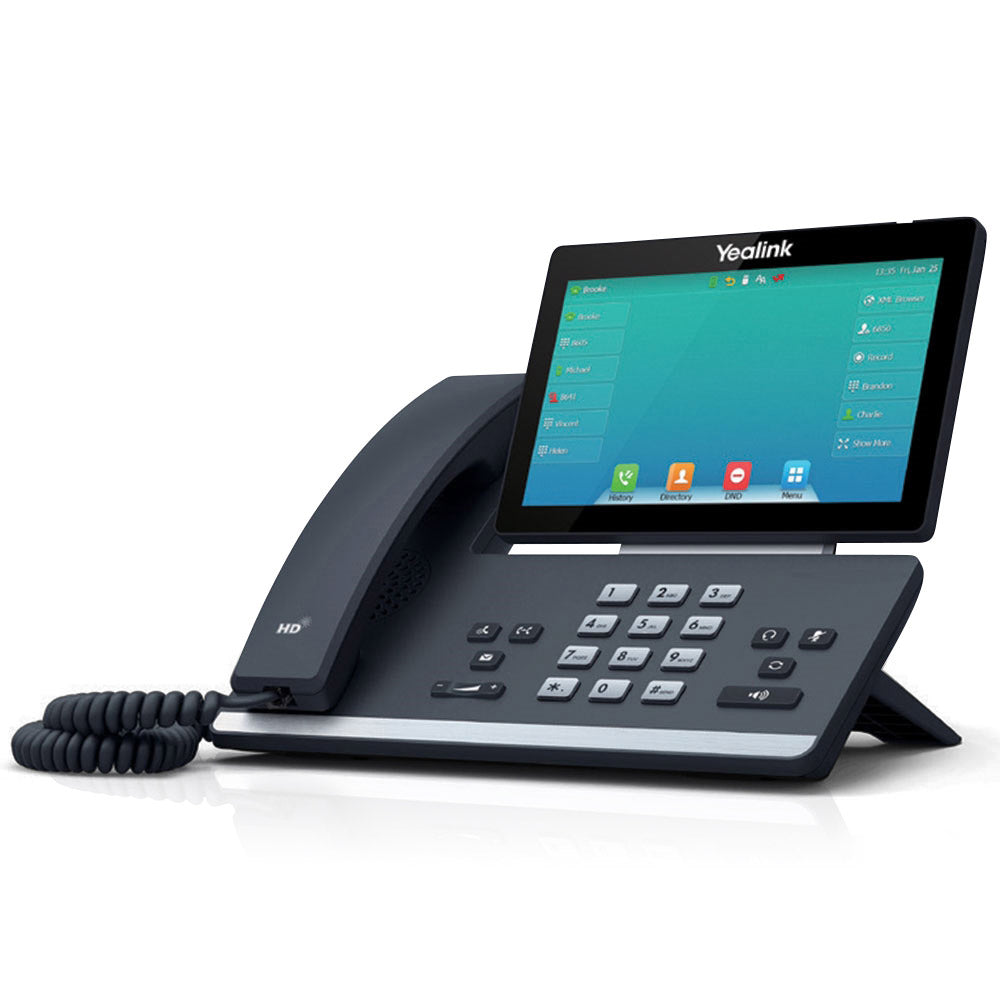 A left-angled view of a black T57W Executive IP Phone displayed on a white background. The phone features a 7” 800 x 480 capacitive adjustable touch screen. The silver number buttons on the dashboard and other functionality buttons are clearly visible.